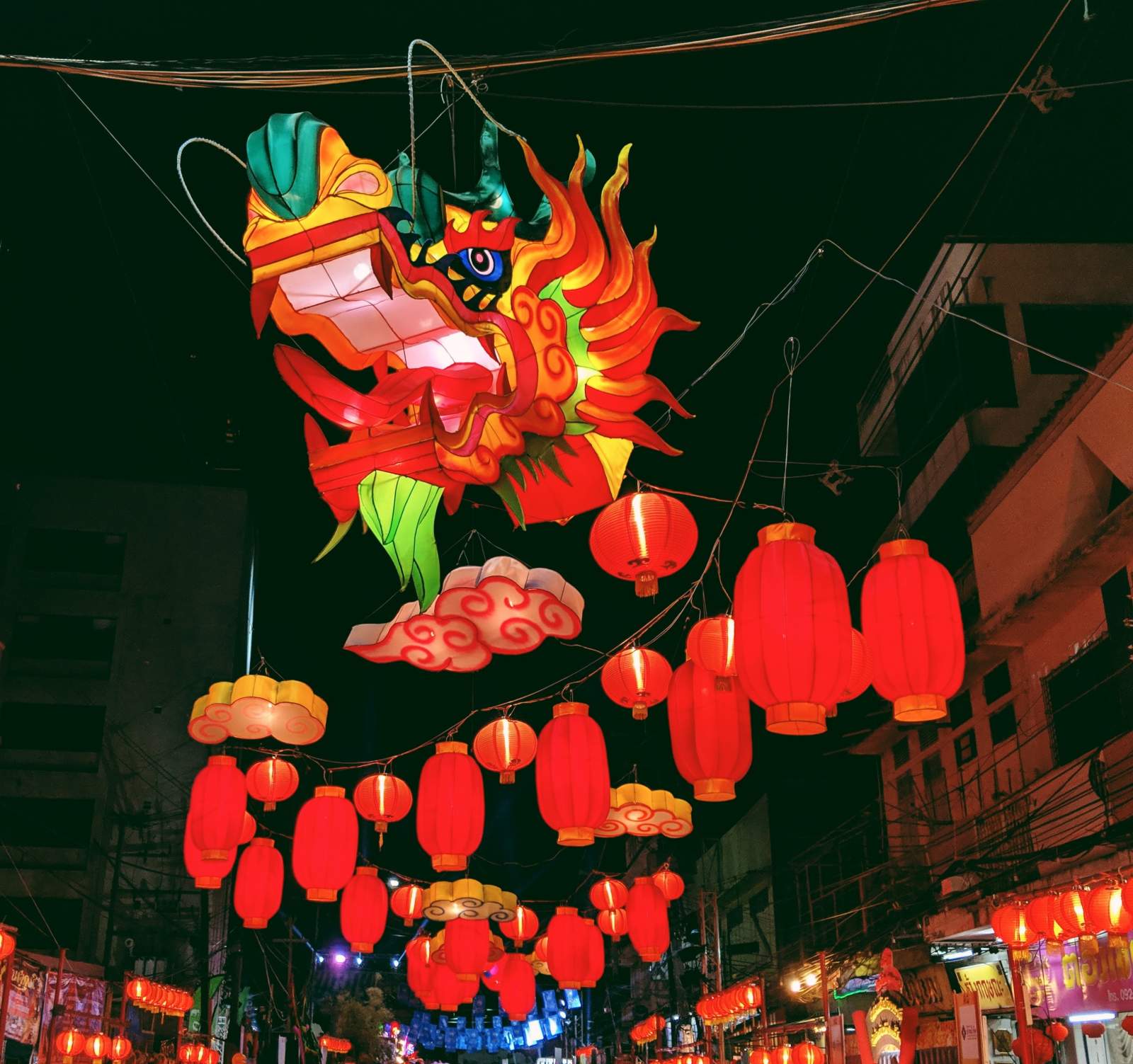 Red paper lanterns , cloud lanterns and a dragon lantern hanging